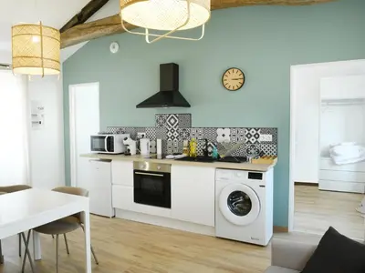 Cuisine ou kitchenette dans l'établissement L'élégant, T2 avec climatisation, wifi