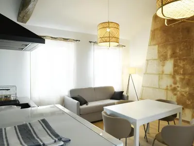 Coin salon dans l'établissement L'élégant, T2 avec climatisation, wifi