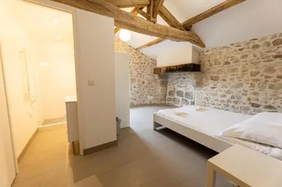 Un ou plusieurs lits dans un hébergement de l'établissement Château de Chausserais - 5 chambres - 4 salles de bain