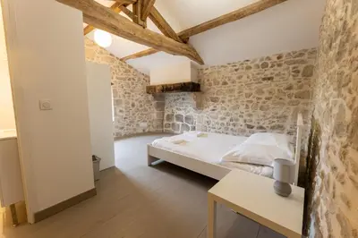 Un ou plusieurs lits dans un hébergement de l'établissement Château de Chausserais - 5 chambres - 4 salles de bain