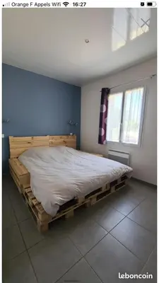 Un ou plusieurs lits dans un hébergement de l'établissement Pavillon avec piscine