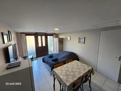 Télévision ou salle de divertissement dans l'établissement Gîte 2 adultes et 2 enfants à 30mn PuyduFou