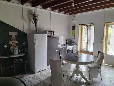 Cuisine ou kitchenette dans l'établissement Studio en toute simplicité