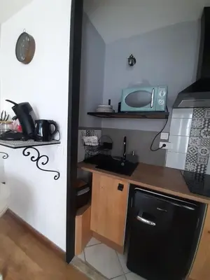 Cuisine ou kitchenette dans l'établissement Le Petit Gîte de la gare