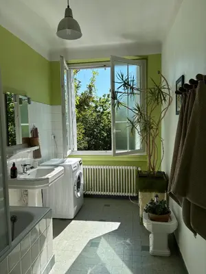 Un ou plusieurs lits dans un hébergement de l'établissement Havre de paix cosy avec jardin proche du centre-ville de Poitiers