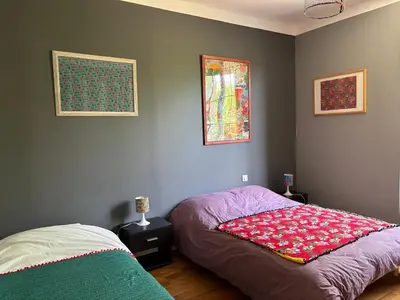 Un ou plusieurs lits dans un hébergement de l'établissement Havre de paix cosy avec jardin proche du centre-ville de Poitiers