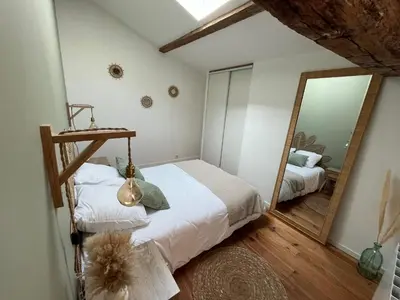 Un ou plusieurs lits dans un hébergement de l'établissement Appartement à la campagne