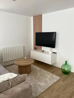 Télévision ou salle de divertissement dans l'établissement Appartement à la campagne