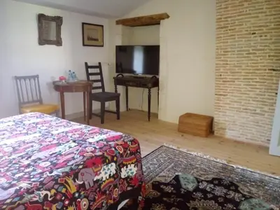 Télévision ou salle de divertissement dans l'établissement Chateau De Champdolent