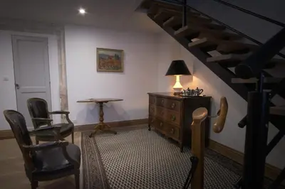 Coin salon dans l'établissement Chateau De Champdolent
