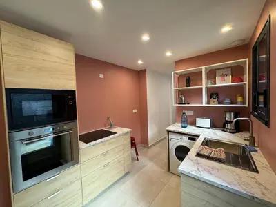 Cuisine ou kitchenette dans l'établissement Loft avec Parking au centre historique de Saintes