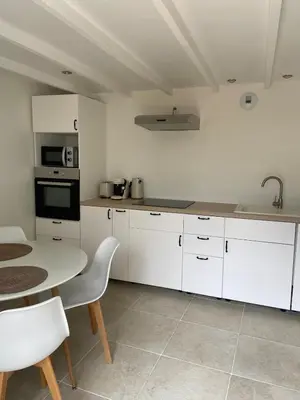 Cuisine ou kitchenette dans l'établissement Charmante Maison de Campagne
