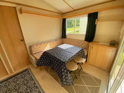 Un ou plusieurs lits dans un hébergement de l'établissement Camping du Fouilloux