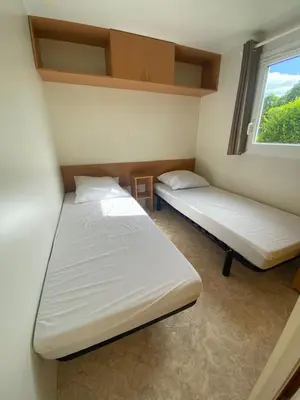Un ou plusieurs lits dans un hébergement de l'établissement Camping du Fouilloux