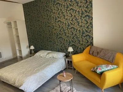 Un ou plusieurs lits dans un hébergement de l'établissement Maison mitoyenne proche Cognac