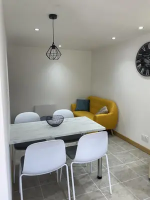 Coin salon dans l'établissement Maison mitoyenne proche Cognac