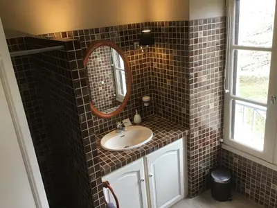 Salle de bains dans l'établissement Le clos de la huppe - suite familiale