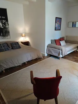 Un ou plusieurs lits dans un hébergement de l'établissement La Huppe - Chambre d'hote
