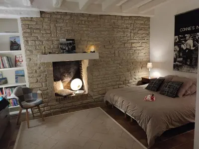 Un ou plusieurs lits dans un hébergement de l'établissement La Huppe - Chambre d'hote