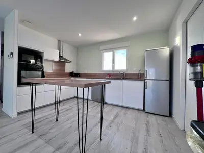 Cuisine ou kitchenette dans l'établissement Maison 6 personnes