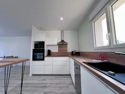 Cuisine ou kitchenette dans l'établissement Maison 6 personnes