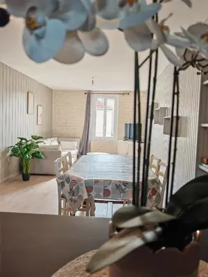Un ou plusieurs lits dans un hébergement de l'établissement l'appart Orchidée n12, cosy et lumineux