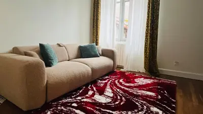 Coin salon dans l'établissement Appartement Quartier Jardin Public