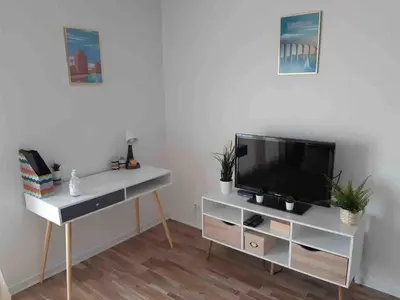 Télévision ou salle de divertissement dans l'établissement Laïa, studio type Scandinave, parking