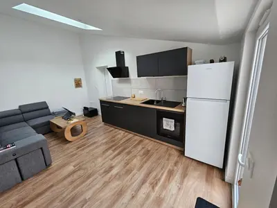 Cuisine ou kitchenette dans l'établissement Accueillant T2 avec terrasse privée