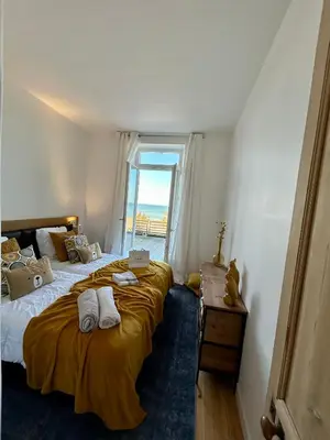 Un ou plusieurs lits dans un hébergement de l'établissement La Villa Ô Dunes Front de Mer