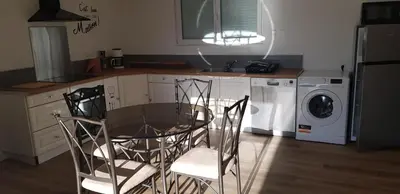 Cuisine ou kitchenette dans l'établissement les bouchos