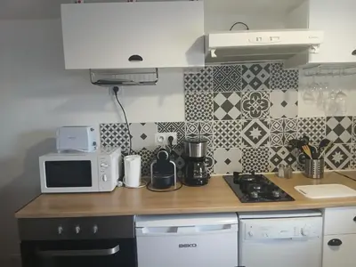Cuisine ou kitchenette dans l'établissement le coquelicot
