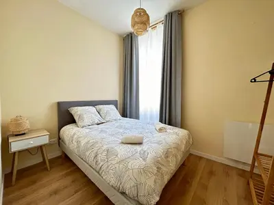 Un ou plusieurs lits dans un hébergement de l'établissement Appartement - 1 chambre - Centre-ville
