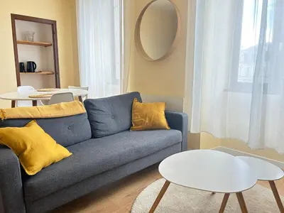 Coin salon dans l'établissement Appartement - 1 chambre - Centre-ville