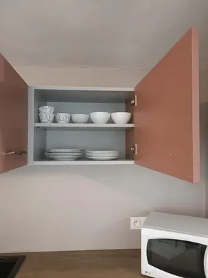 Cuisine ou kitchenette dans l'établissement T2 MEUBLÉ plein centre-ville
