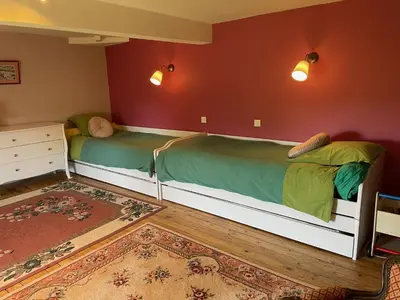 Un ou plusieurs lits dans un hébergement de l'établissement La Villa Rouge