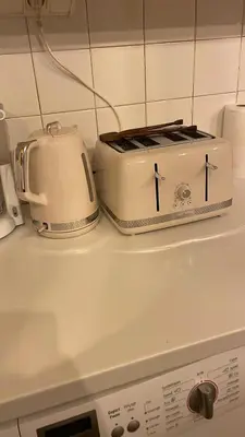 Cuisine ou kitchenette dans l'établissement La Villa Rouge