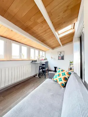 Un ou plusieurs lits dans un hébergement de l'établissement Charmant appartement cosy en plein centre