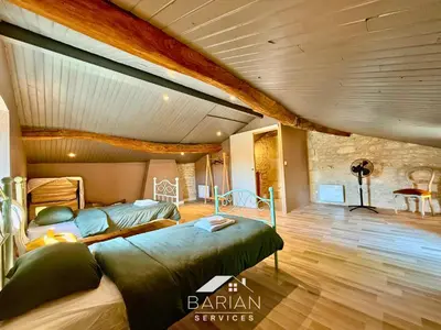 Coin salon dans l'établissement Maison climatisée 8 personnes - 3 chambres - calme et détente