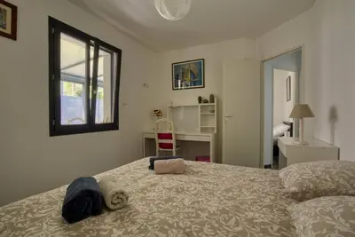 Un ou plusieurs lits dans un hébergement de l'établissement Villa Moderne Piscine - 6p - Calme - Angoulême
