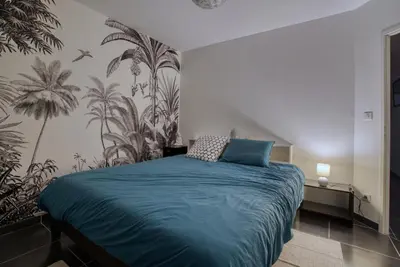 Un ou plusieurs lits dans un hébergement de l'établissement Villa Moderne Piscine - 6p - Calme - Angoulême