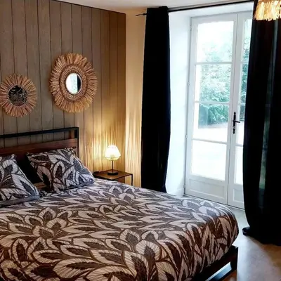 Un ou plusieurs lits dans un hébergement de l'établissement Chambre chez l'habitant