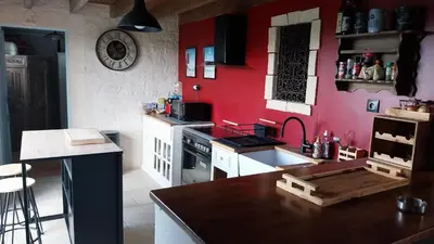 Cuisine ou kitchenette dans l'établissement Chambre chez l'habitant