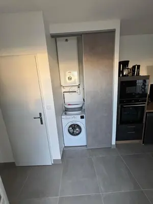 Cuisine ou kitchenette dans l'établissement T2 neuf avec terrasse privative proche gare