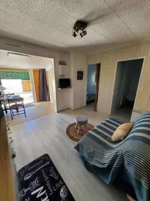 Un ou plusieurs lits dans un hébergement de l'établissement Petite maison proche rivière