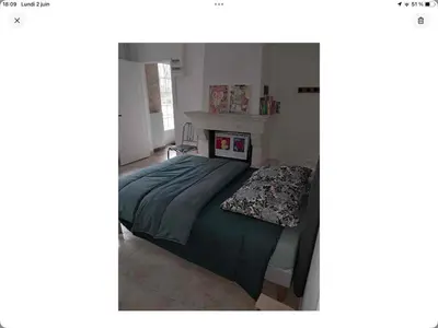 Un ou plusieurs lits dans un hébergement de l'établissement Gîte La Maison d Hélène