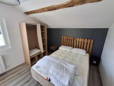 Un ou plusieurs lits dans un hébergement de l'établissement Gîte au milieu de la campagne