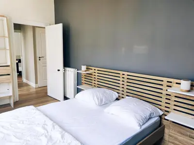Un ou plusieurs lits dans un hébergement de l'établissement Maison de ville au calme