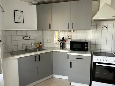 Cuisine ou kitchenette dans l'établissement Idéal famille - Proche sites touristiques