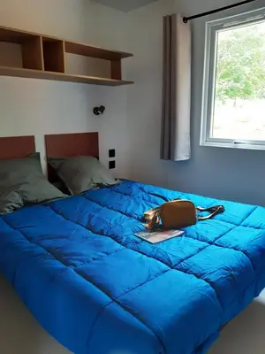 Un ou plusieurs lits dans un hébergement de l'établissement Les Lodges de l'Aubertière